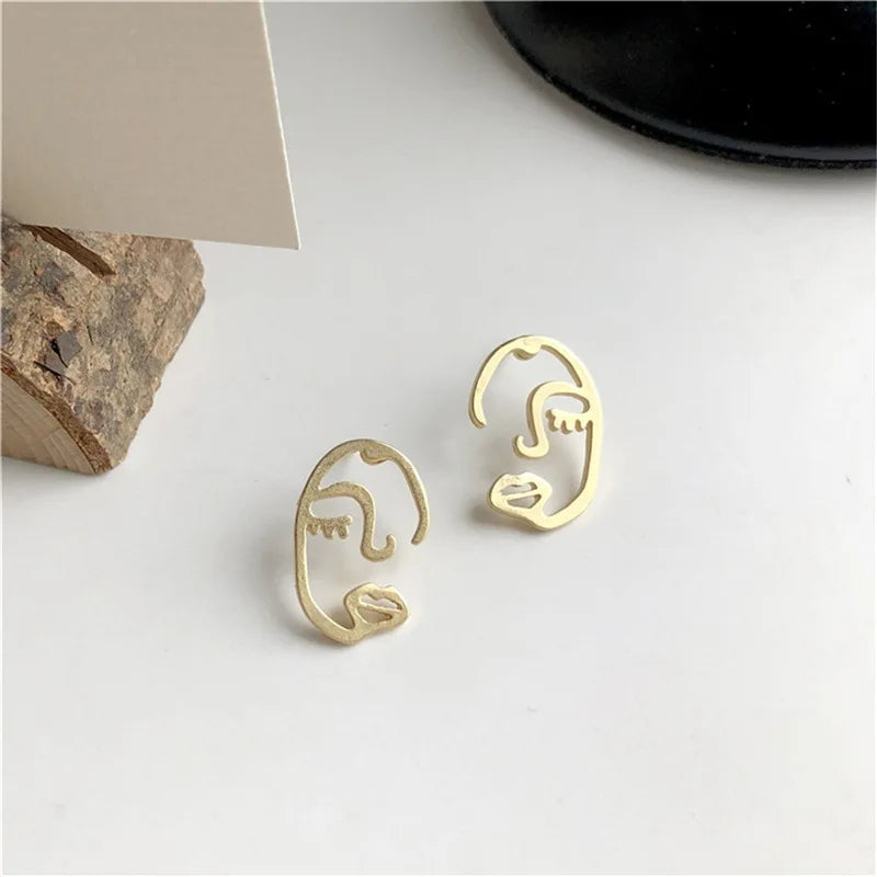 Tiny Muse Face Earrings